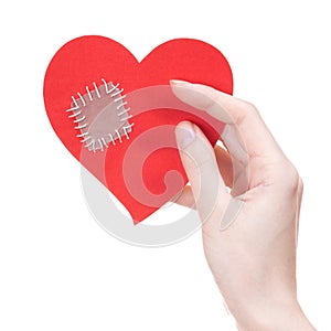 Girl holding Valentine's day broken heart card