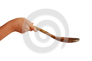 Girl holding a wooden spoon
