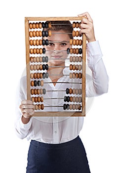 Girl holds in front of abacus