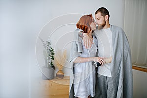 Girl holds her boyfriend by artificial limb