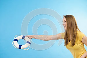 Girl holds life buoy rescue ring