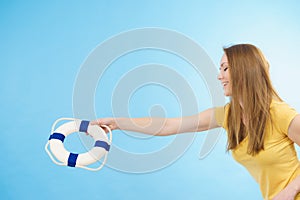 Girl holds life buoy rescue ring