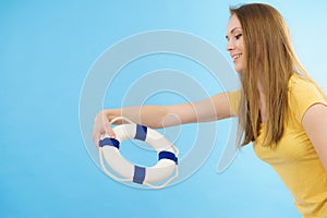 Girl holds life buoy rescue ring