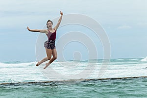 Girl Holidays Jumping Tidal Pool Ocean