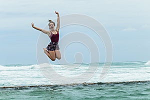 Girl Holidays Jumping Tidal Pool Ocean