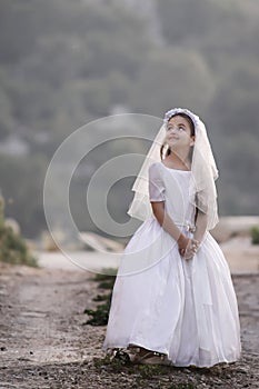 Girl in holy communion dress