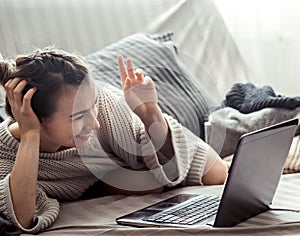 The girl at home at the computer