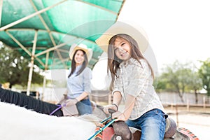 Girl On Horse During Hippotherapy Session