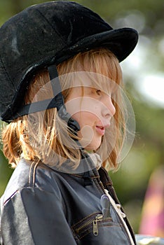 Girl with horse safety hat