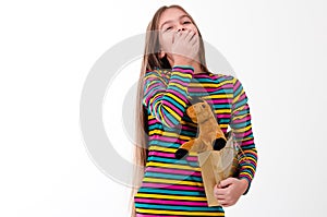 Girl and a horse toy.