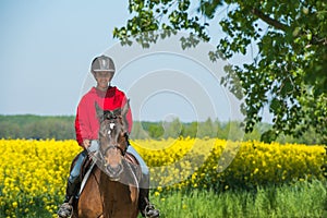 Girl on horseback riding