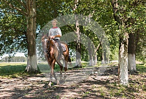 Girl on horseback riding