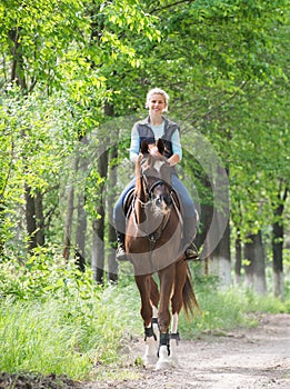 Girl on horseback riding