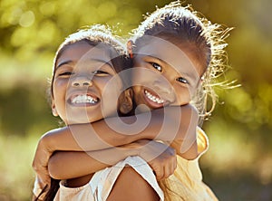 Girl, hug and love, sisters and happy in portrait together, young kids outdoor and family bonding in nature. Indian