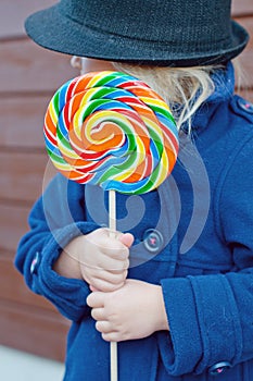 Girl and huge lollypop