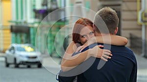 Girl hugging guy front view