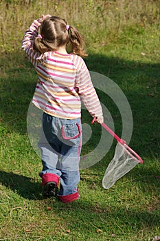 Girl hunting butterflies