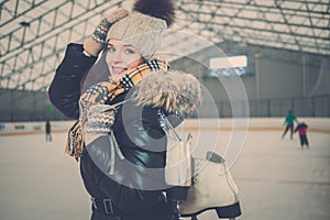 Girl on ice skating rink