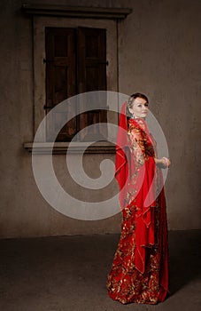 Girl at the image of Turkish sultan's wife