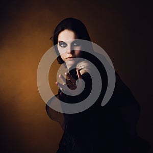 Girl in an image of a witch