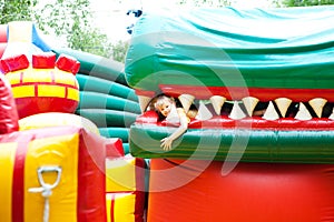 Girl in the inflatable entertainment park