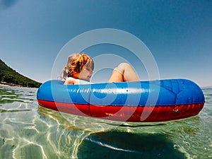 Girl in inflatable raft