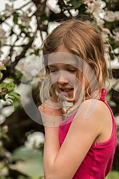 Girl infront of appletree