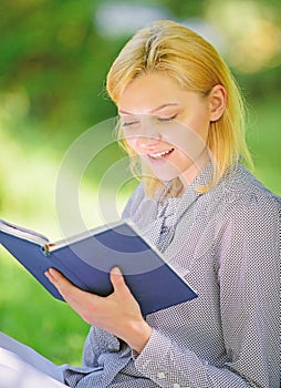 Girl interested sit park read book nature background. Reading inspiring books. Female literature. Relax leisure an hobby