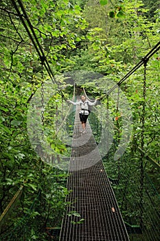 Girl on iron bridge in Slovak Paradise