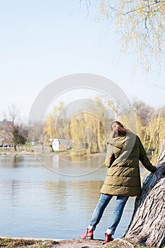 Girl with jacket in a park