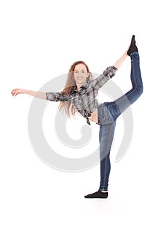 Girl in jeans doing acrobatic stunt