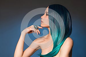 girl with jewelry ring and blue hair