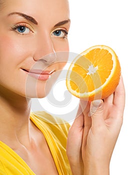 Girl with juicy orange