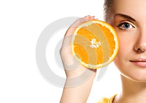 Girl with juicy orange