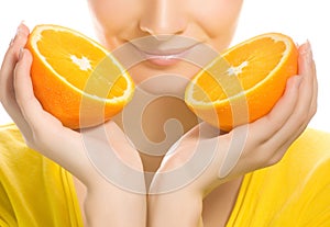 Girl with juicy orange