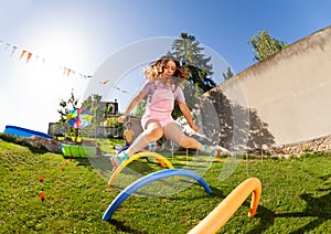 Girl jump high pass many barriers in competition