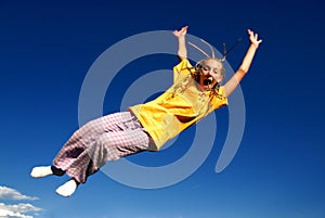 Girl jumping in air