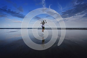 A girl jumping at beach