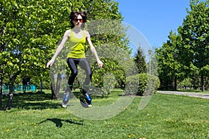 Girl in jumping boots outdoors fitness