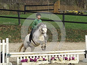 Girl Jumping Horse