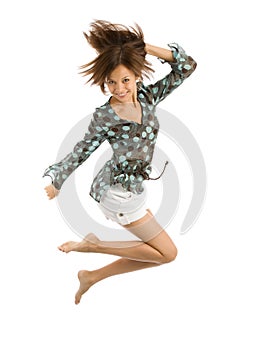 Girl jumping of joy over white