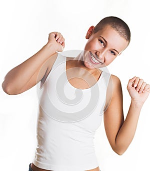 Girl jumping of joy over white