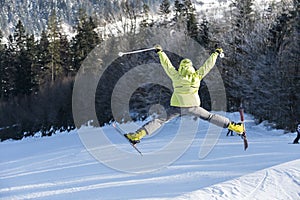 Girl jumping on skis