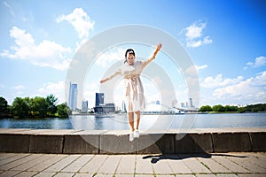 Girl is jumping on a sunny day