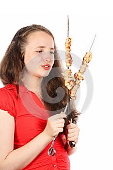 Girl with kebabs photo