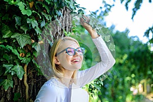 Girl keen on book keep reading. Woman blonde take break relaxing in park reading book. Lady cheerful laugh she likes