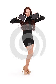 Girl keeps two tablet pc standing sideways