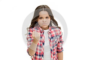 Girl kid threatening with fist isolated on white. Strong personality temper. Threaten with physical attack. Kids