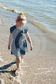 Girl kid walk water sea