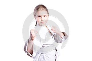 Girl in a kimono judo. In a fighting stance. Isolated on white background.